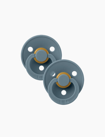 Image of a pacifier in a steel blue on a white background.