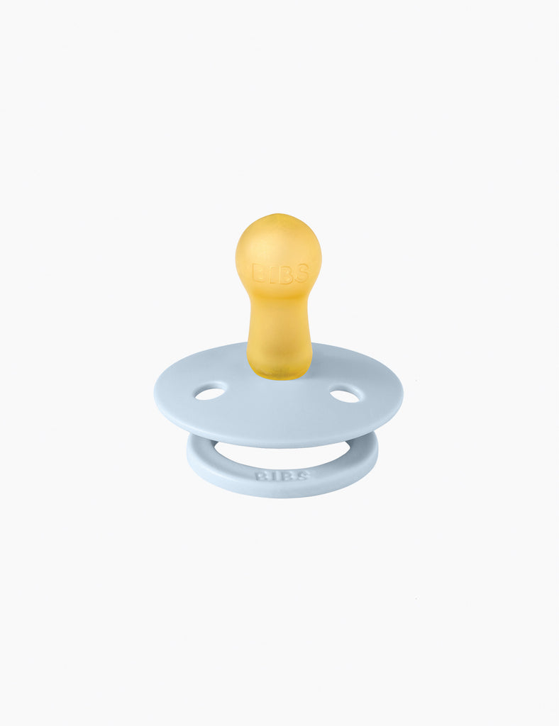 Baby pacifier with yellow handle on a white background