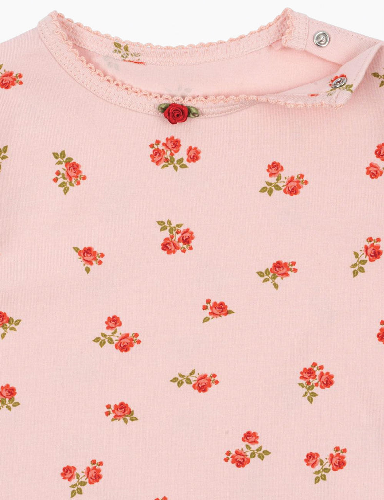 Close-up of a pink fabric with floral pattern