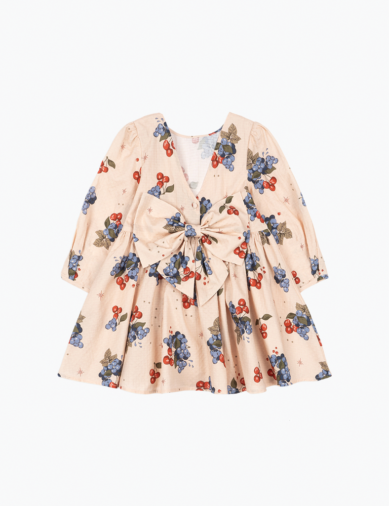 Floral dress with a bow detail on a white background