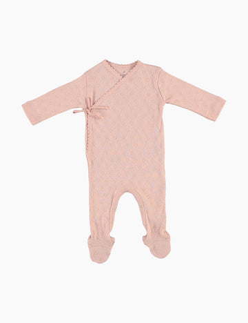 Pink baby onesie with long sleeves on a white background