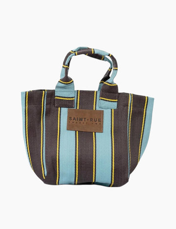 Image of a striped bag with leather branding on a white background