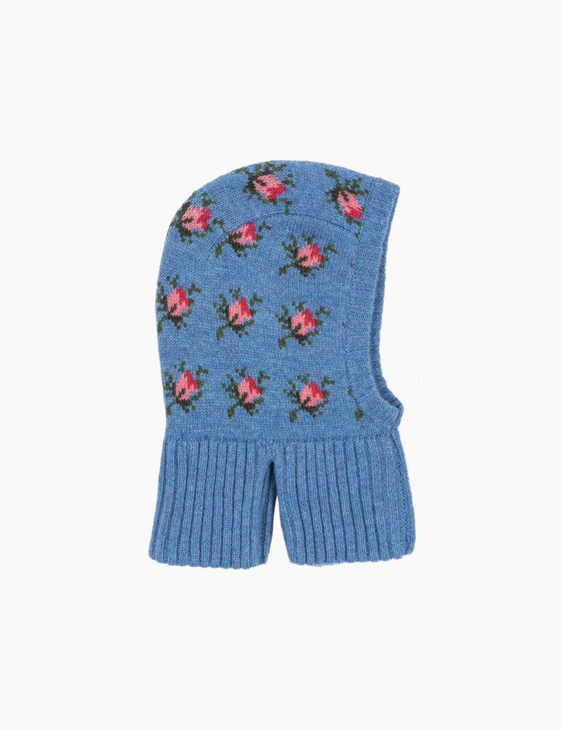 Blue knitted balaclava with floral pattern on a white background