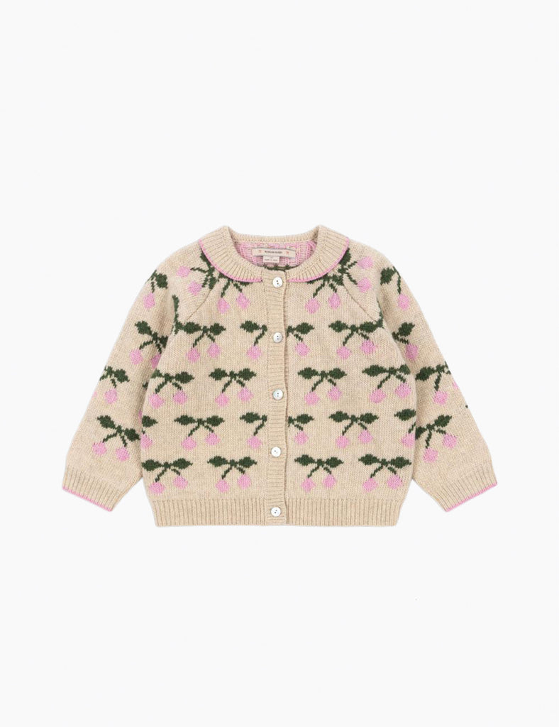Knitted cardigan with cherry pattern on a white background