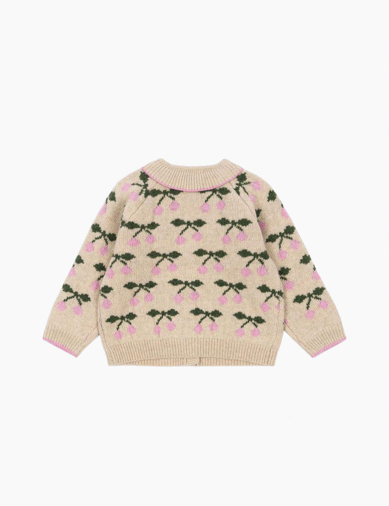 Beige sweater with pink floral pattern on a white background