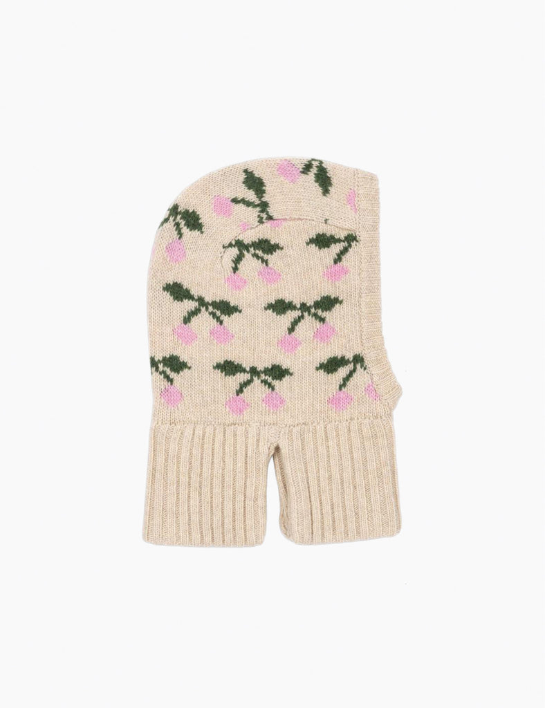 Beige knit balaclava with floral pattern on a white background