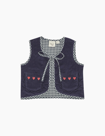 Navy blue vest with checkered pattern and heart details on a white background