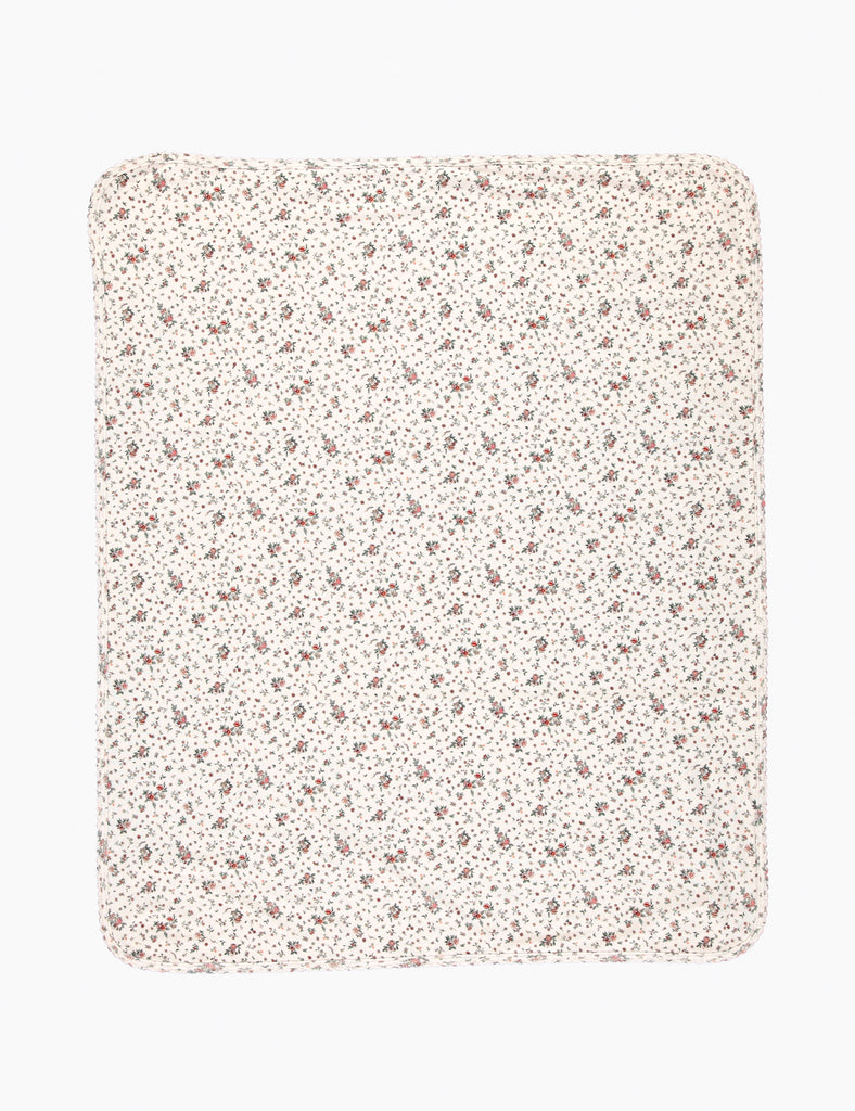 Floral patterned blanket on a white background