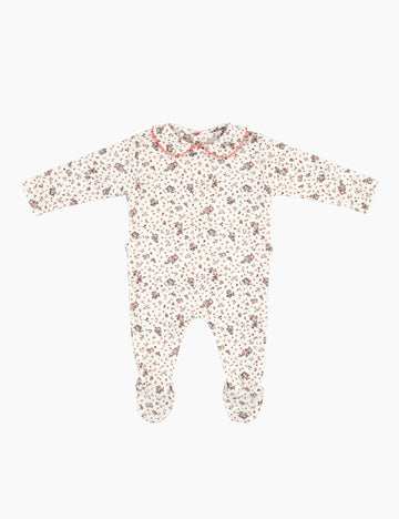 Floral patterned baby onesie on a white background