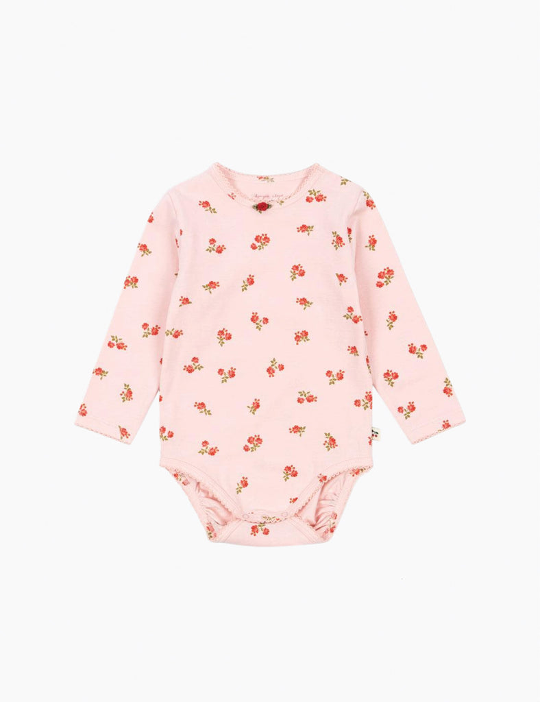 Pink baby bodysuit with floral pattern on a white background