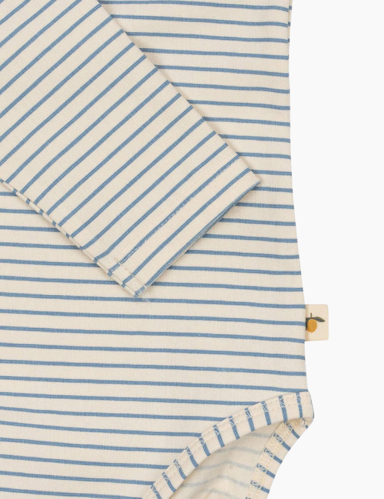 Striped fabric with blue and white lines on a white background