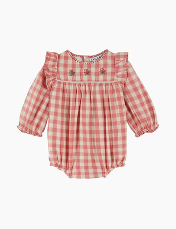 Image of a pink and white check baby romper on a white background.
