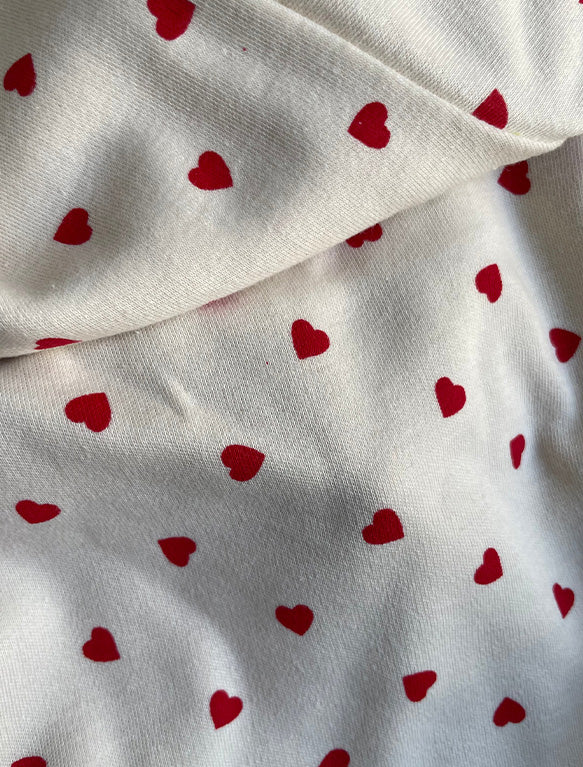 Image of Baby Sleepsuit in Red Hearts.