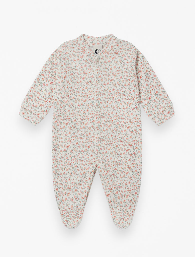 Baby Sleepsuit in Rosy floral flat lay image.