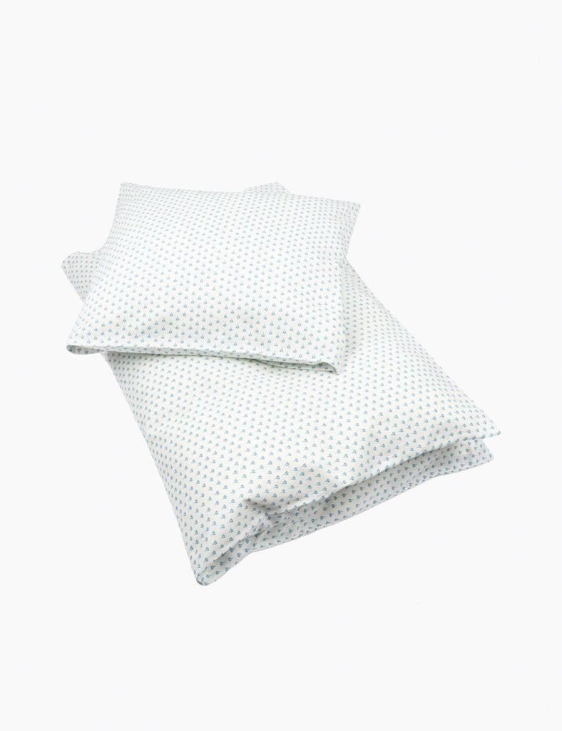 Two pillowcases with a subtle pattern on a white background