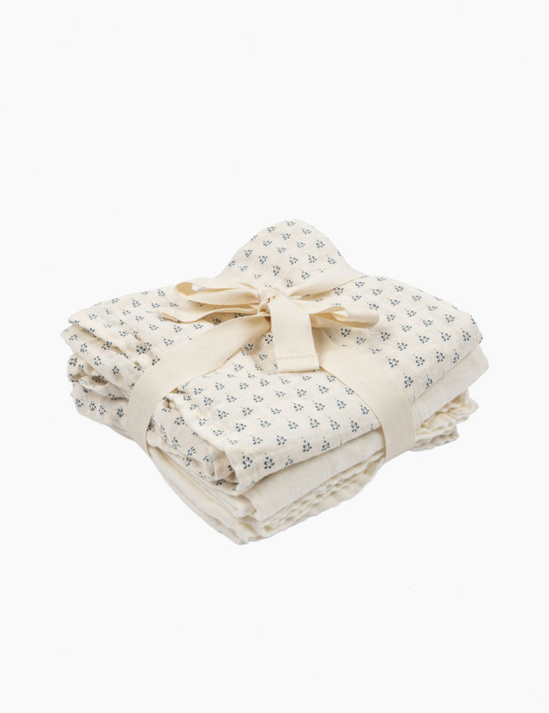 3-pack muslin burp cloths with a floral pattern on a white background