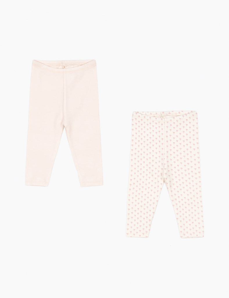 Two pairs of baby leggings on a white background