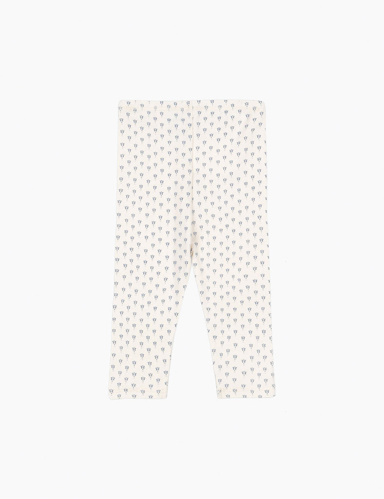 White pants with a subtle pattern on a white background