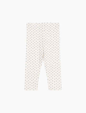 White pants with a subtle pattern on a white background