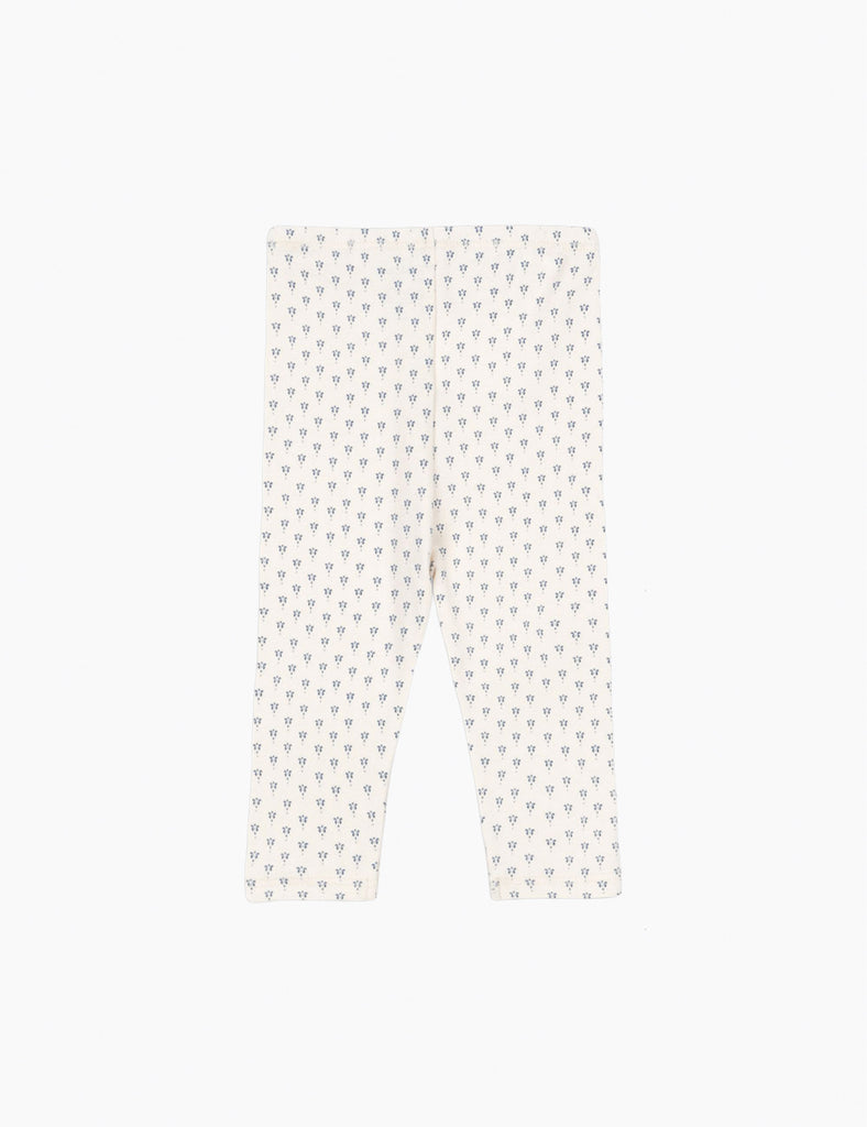 White pants with a subtle pattern on a white background