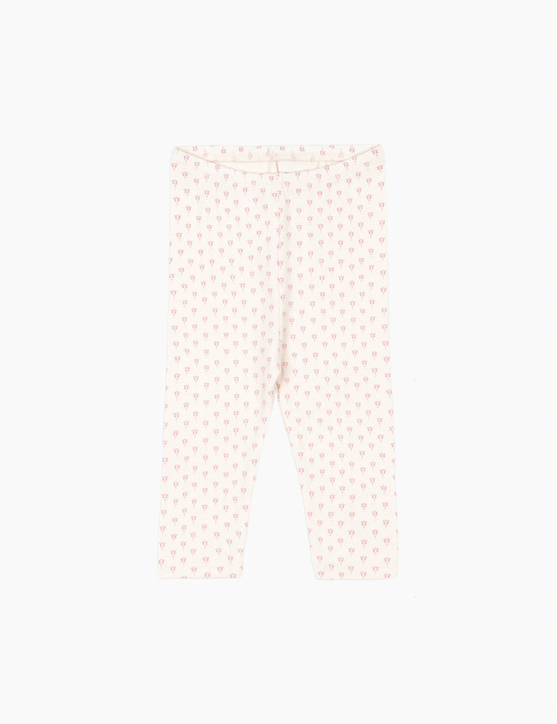 Light pink pants with a subtle pattern on a white background