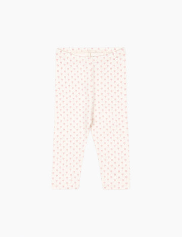 Light pink pants with a subtle pattern on a white background