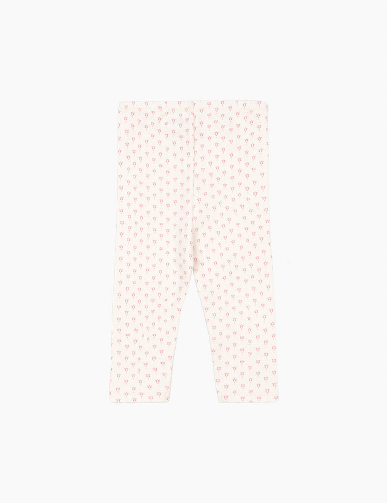 Light pink pants with a subtle pattern on a white background