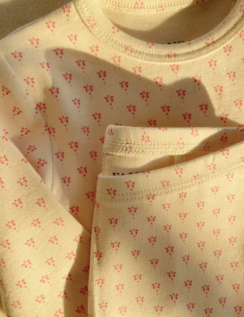 Folded fabric with a subtle pattern on a beige background