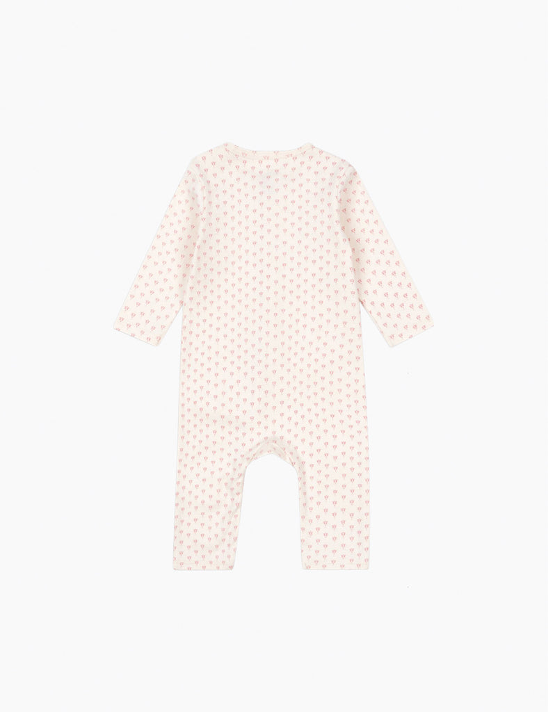 Baby romper with a subtle pattern on a white background