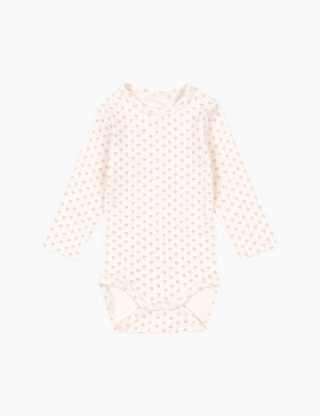 Pink polka dot long-sleeve bodysuit on a white background