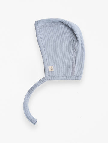 Bloom silk knit bonnet in clearwater blue flat lay image.