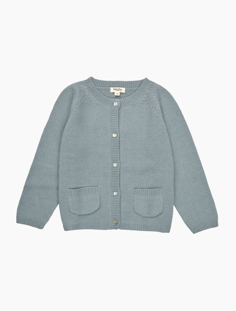 Light blue cardigan with button details on a white background