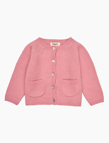 Pink cardigan with button details on a white background