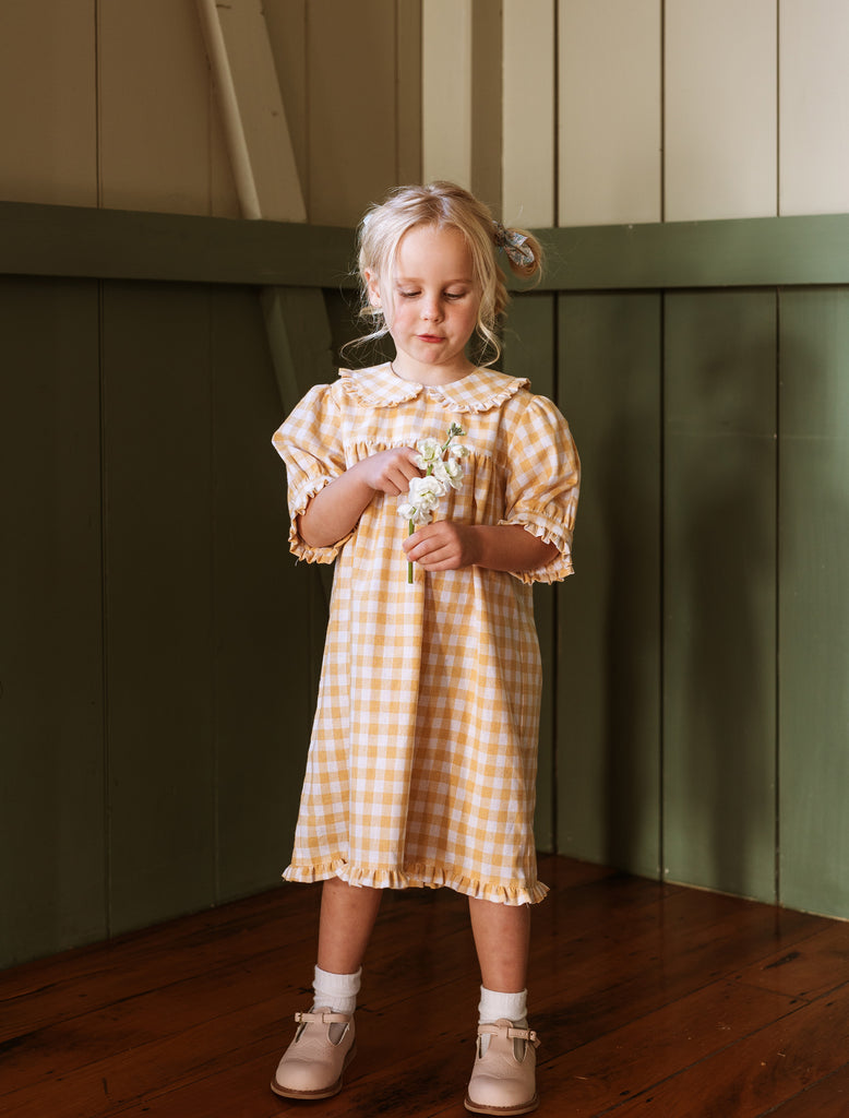 Image of Bonnie Dress in Buttercup Check on model.