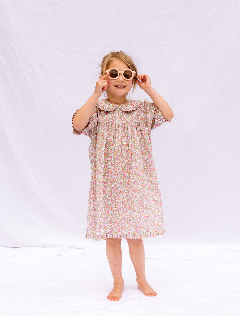 Image of the Bonnie Dress in Fruit Punch on model