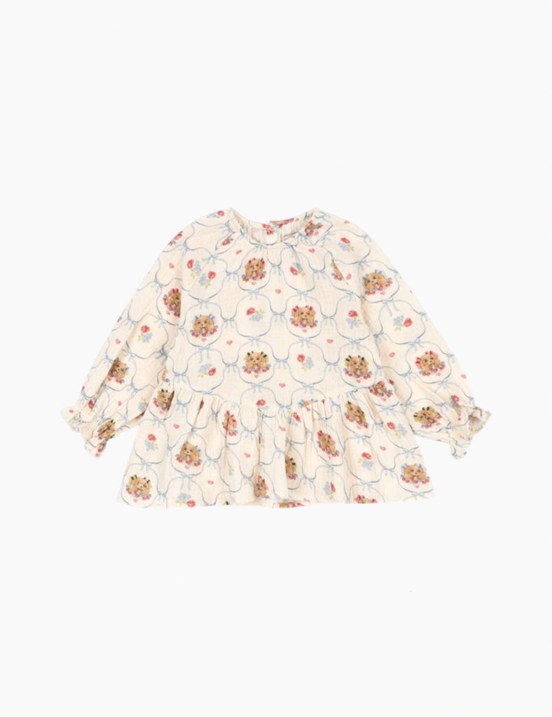 Printed puppy print on a cotton peplum top.