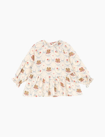 Printed puppy print on a cotton peplum top.