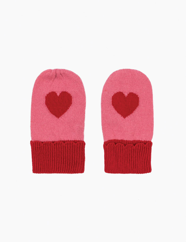 Pair of pink mittens with red hearts on a white background