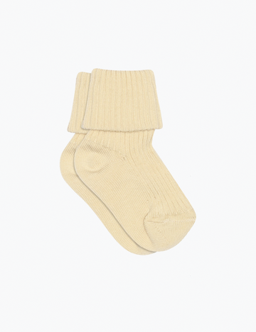 Pair of beige socks on a white background