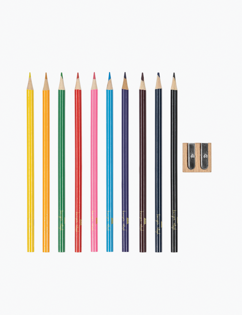 Set of colored pencil and a sharpener on a white background.