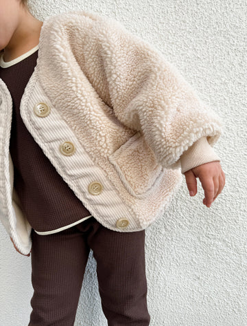 Claire Jacket in Beige on model image close-up.