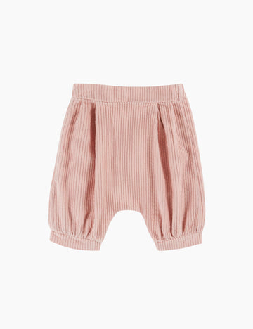 Pink baby pants on a white background
