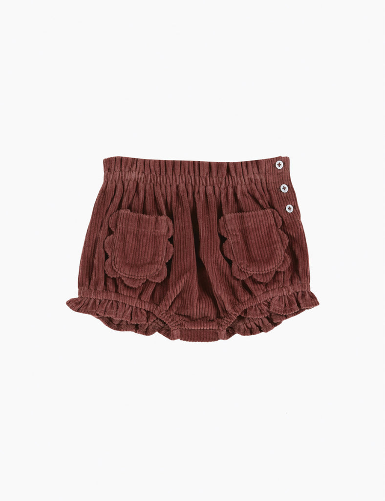 Brown baby bloomers with button details on a white background