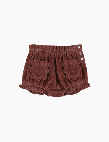 Brown baby bloomers with button details on a white background