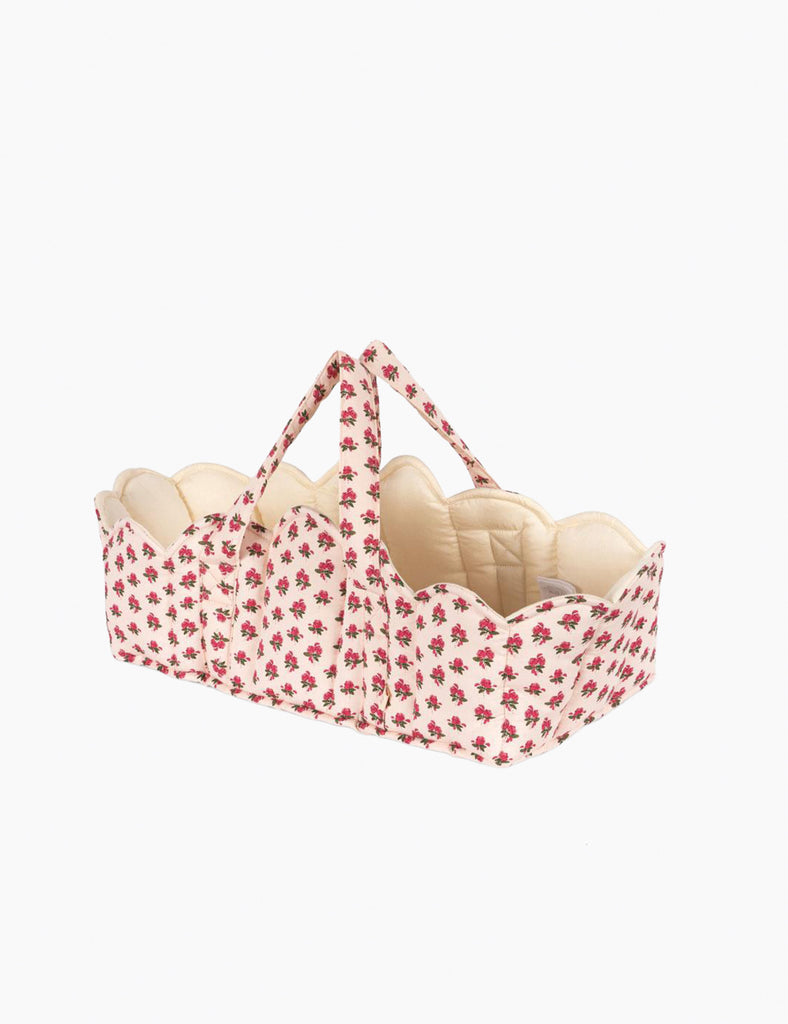Baby carrier with floral pattern on a white background
