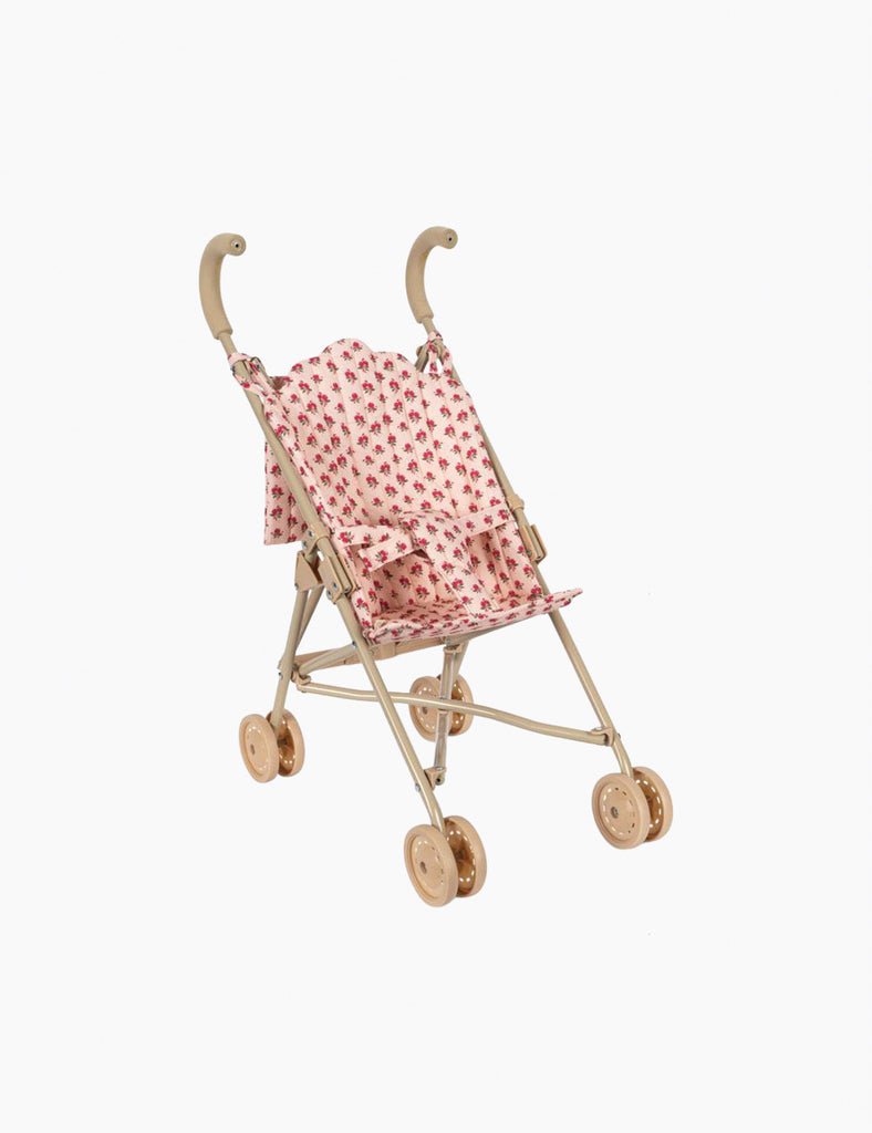 Miniature doll stroller with pink floral canopy on a white background
