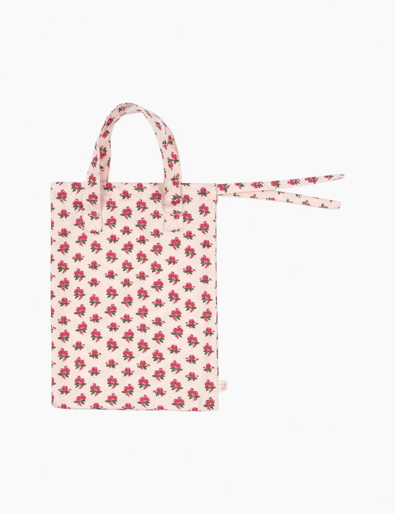 Floral-patterned tote bag on a white background