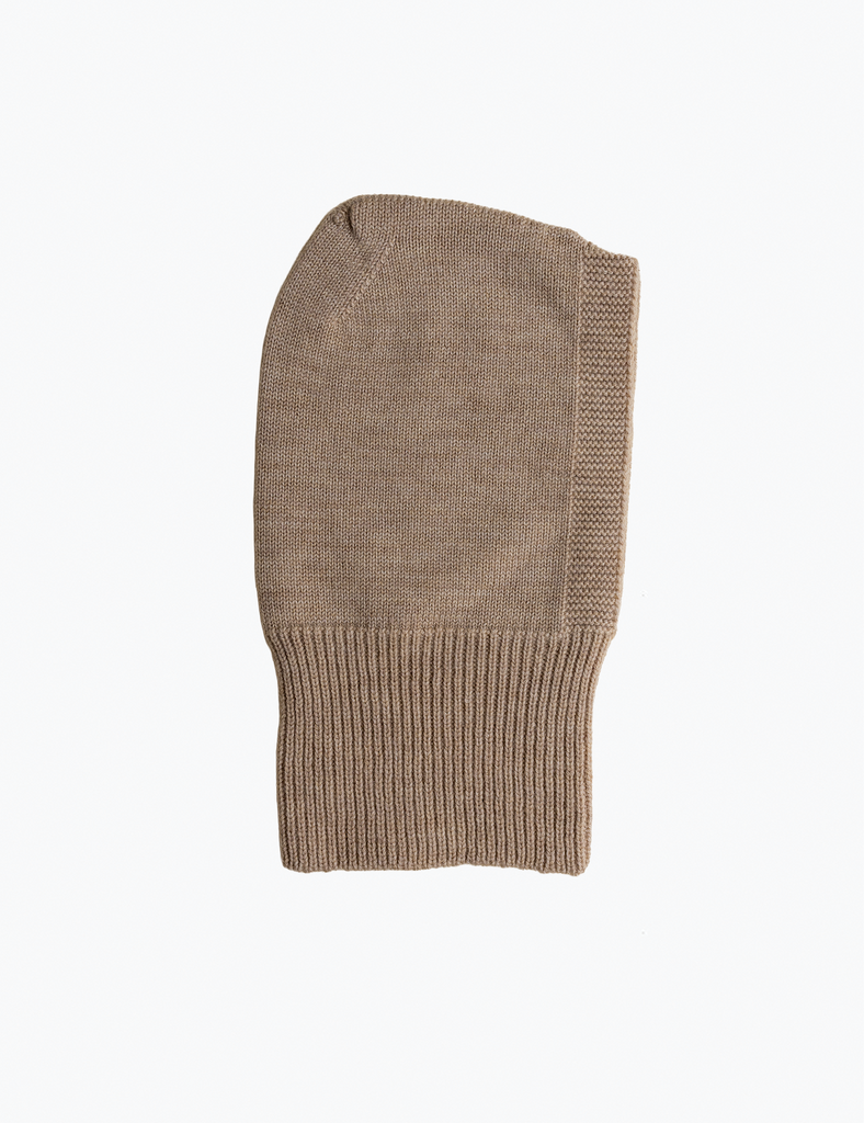 Image of a knitted head scarf in a light brown color on a white background.