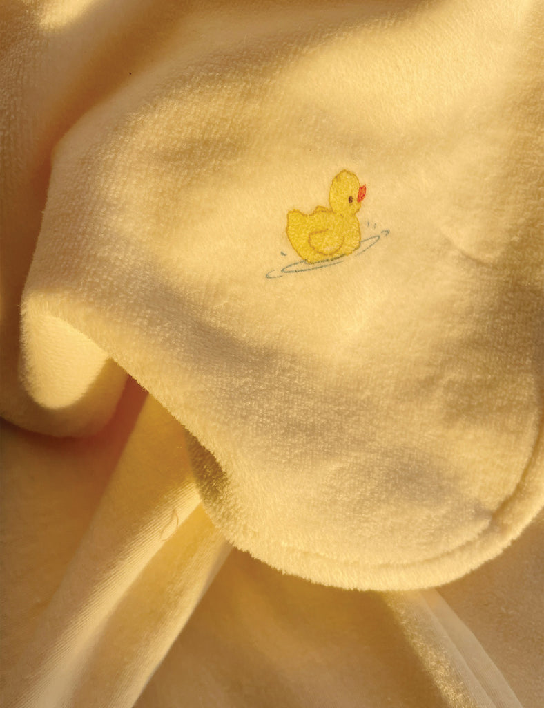 Image of soft baby blanket in antique white