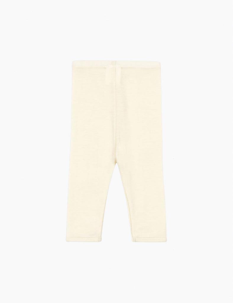 Cream wool leggings on a white background